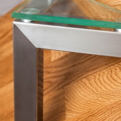Угловой элемент журнальнального стола. Основание - нержавеющая сталь, шлифованная поверхность, столешница - стекло